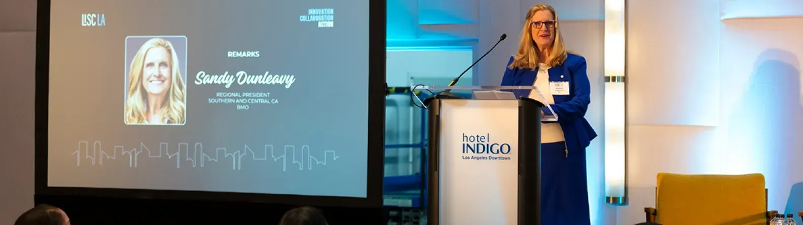 Woman standing at a podium
