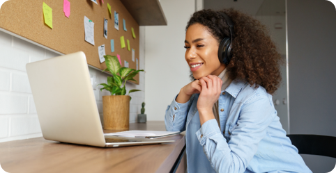 A woman makes a credit card payment online to build her credit rating