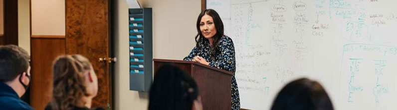 Leili McMurrough speaking at a podium